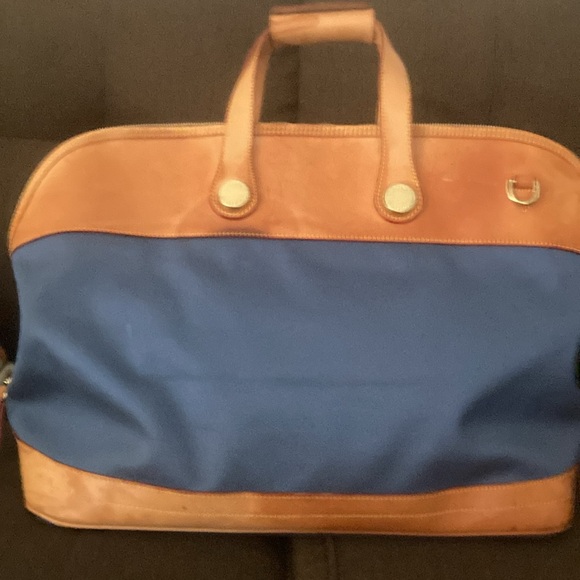 Dooney & Bourke Handbags - DOONEY & BOURKE Blue & Tan large travel bag.